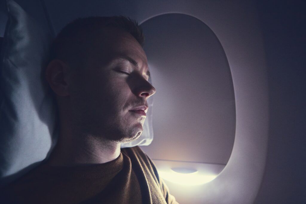como dormir em um avião